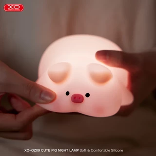 چراغ خواب سیلیکونی شارژی ایکس او مدل XO OZ09 با طراحی فانتزی خوک صورتی